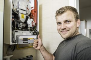 Technician Performing Furnace Maintenance